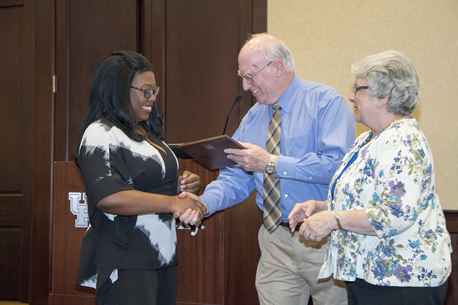 Lisa Dunkley accepting the award from the Burberrys.