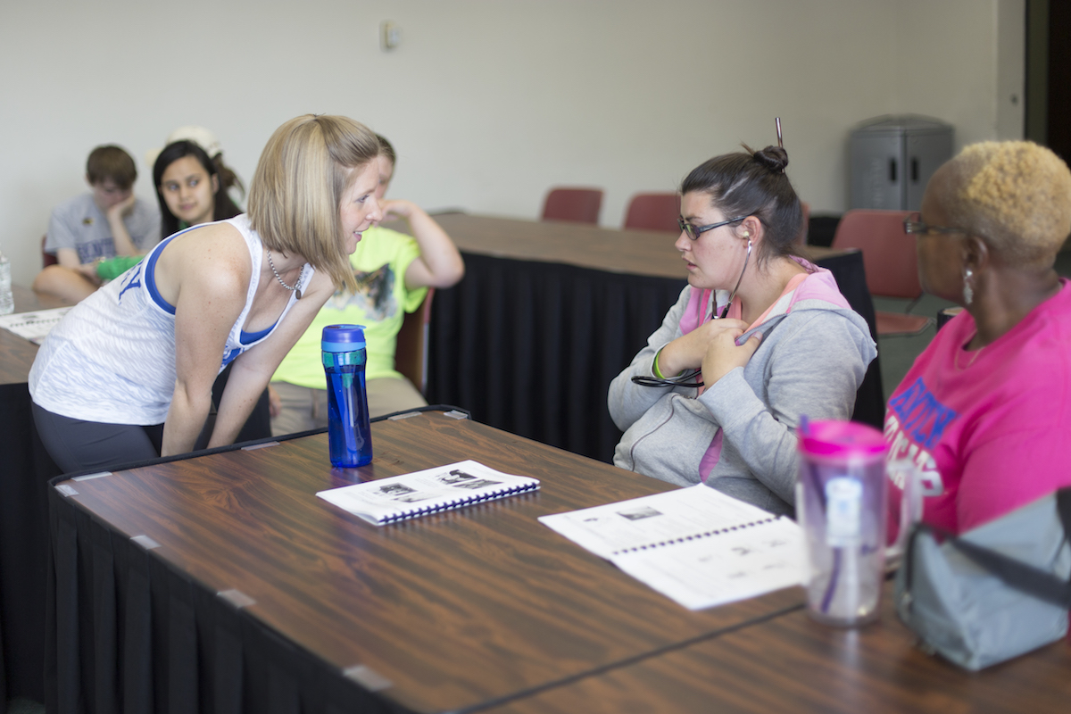 Photo of Lindsey Mullis measuring heart rates.