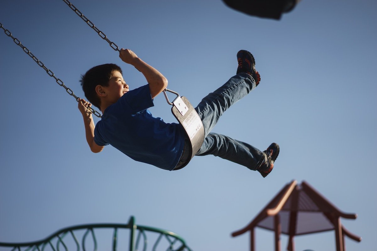 Child on swing.