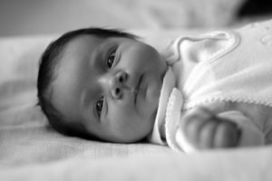 b/w photo of infant with black hair