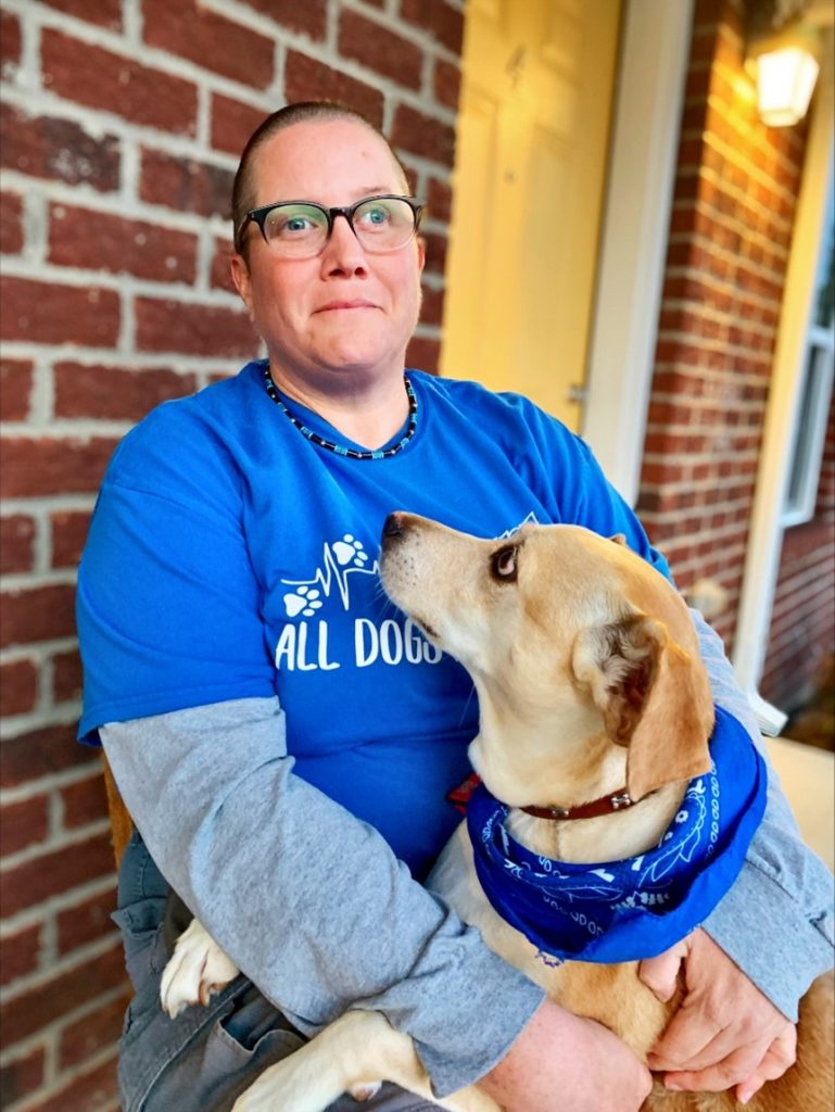 Photo of Kristopher Gruber LEND Student with a dog