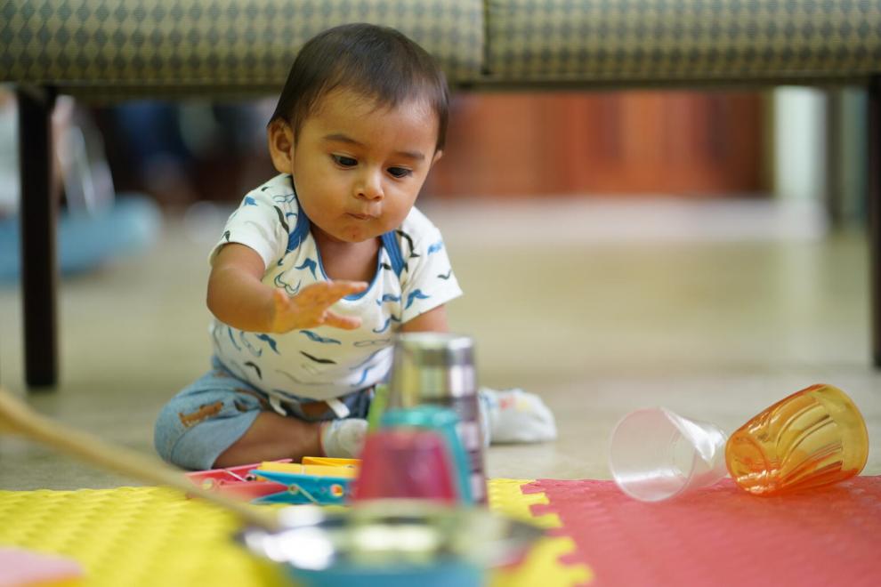 baby playing with blocks