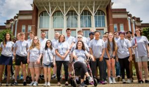 2024 Summer Camp Group Photo in front of the Library